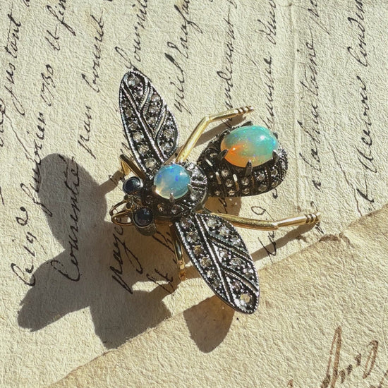 I just had to share how the sunlight through the trees on a windy day played with the internal flash of these yummy opals.